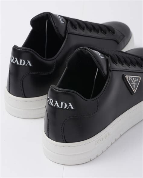 mens low top prada sneakers|prada black sneakers ladies.